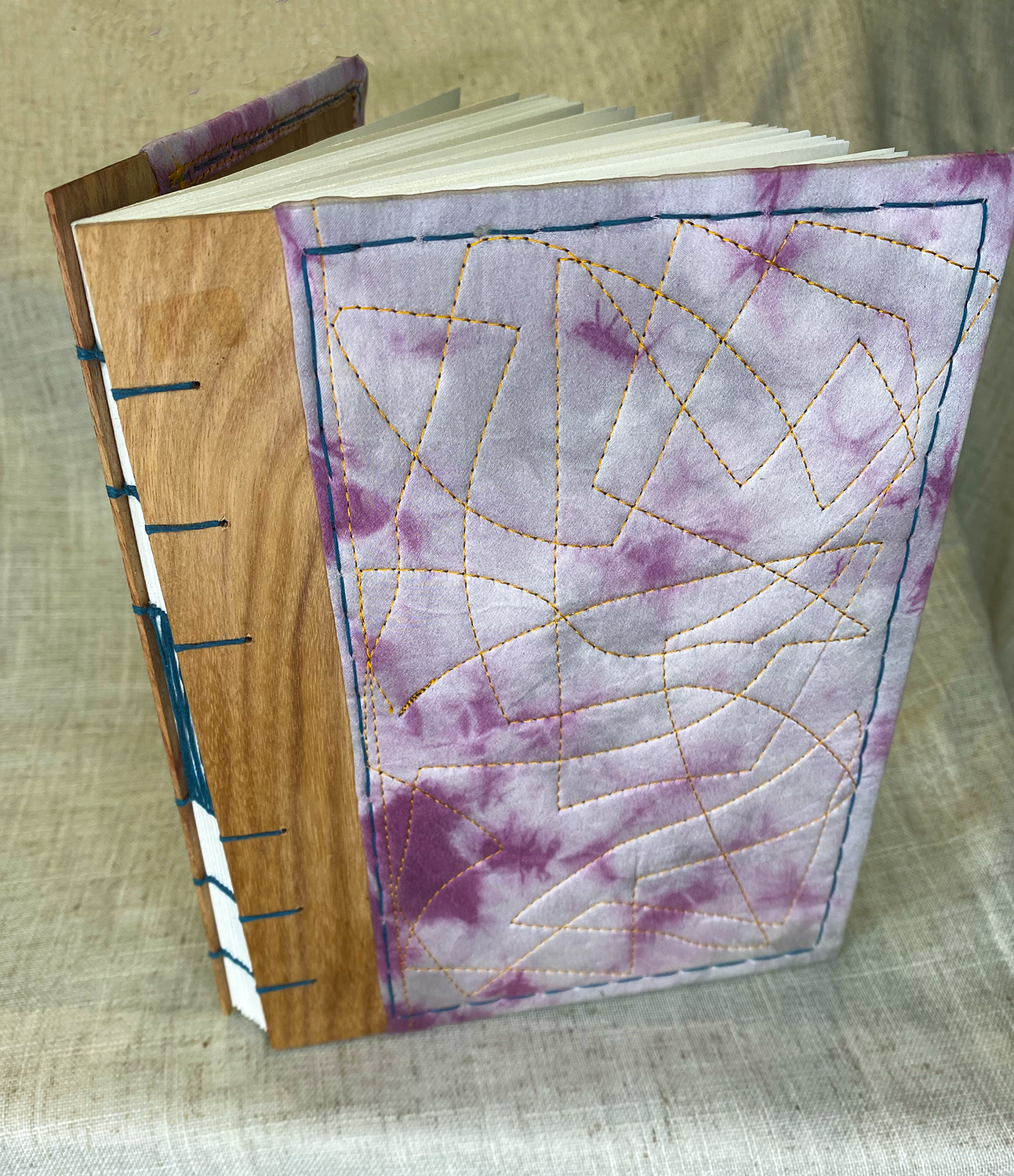 Journal-sized 6"x8" - Light Cochineal + Iron Swirl Silk on Canarywood w/ Teal Stitching