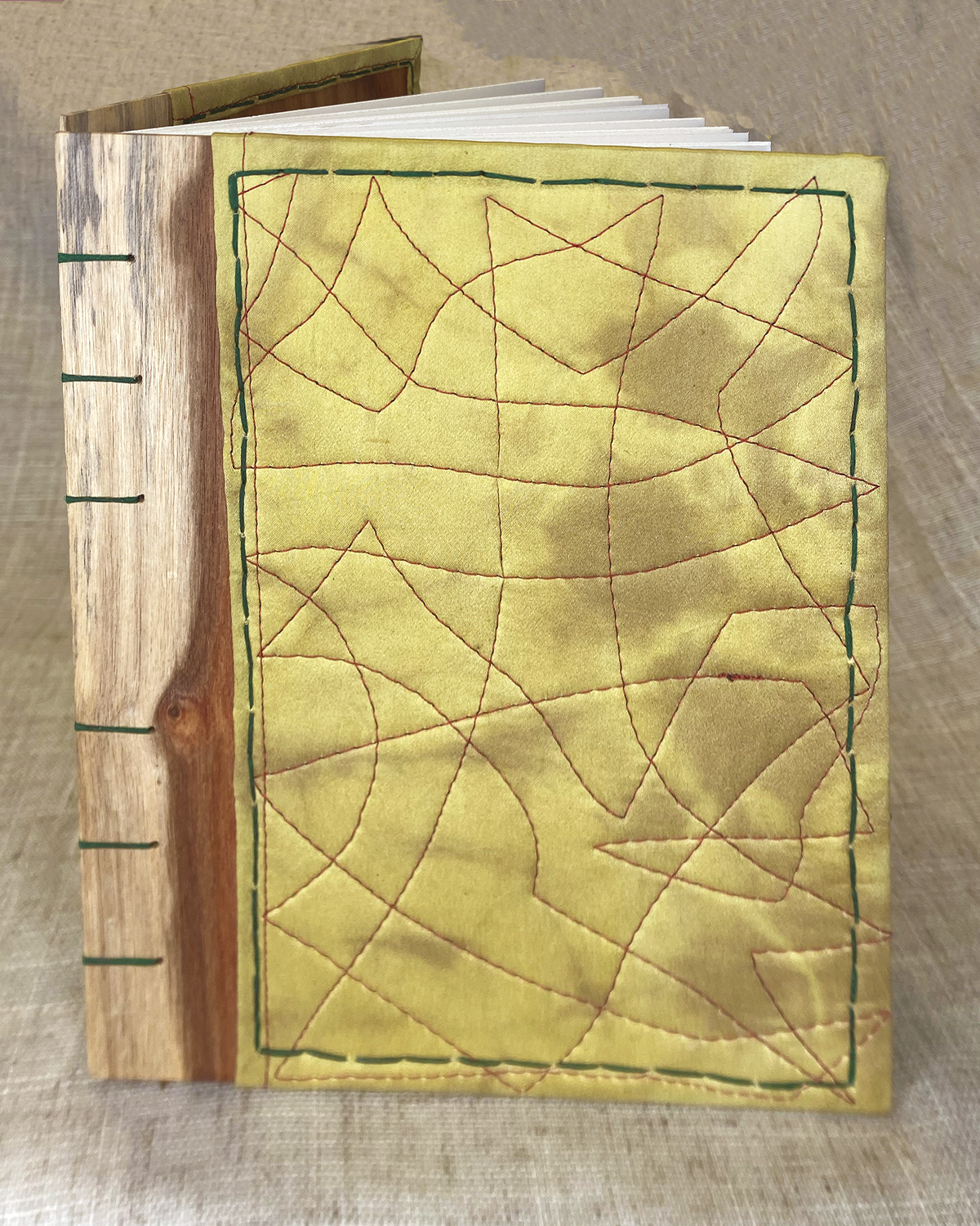 Journal-sized 6"x8" - Weld + Iron Swirl Silk on Canarywood w/ Emerald Stitching